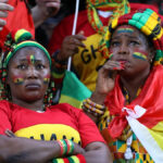 Fanúšikovia Ghany oslavujú svoj prvý gól počas zápasu Unity Cup proti Nigérii