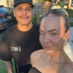 Hviezda Collingwoodu Bobby Hill sa stal obeťou falošnej fotografie vytvorenej AI, keď si dal ďalšiu prestávku v hre po rozchode s partnerkou Georgiou Devlin (na spoločnom obrázku)