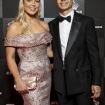 Bobby Hill sa nevrátil do Collingwoodu na predsezónny tréning a teraz je na dovolenke (na obrázku s bývalou partnerkou Georgia Devlinovou)