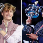 Naomi Osaka je držiteľkou trofeje Australian Open v roku 2021. Oblečenú má modrošedú teplákovú bundu s ružovým zipsom, na hlave má modrý šilt a široko sa usmieva.