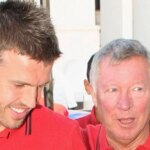 Michael Carrick a Sir Alex Ferguson sa rozprávajú počas turné.