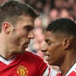 Michael Carrick a Marcus Rashford sú bývalí spoluhráči Manchestru United