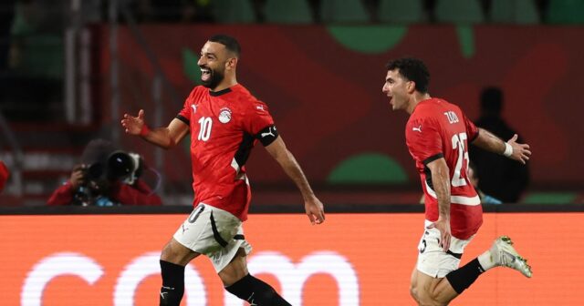 Prečo Mo Salahov žiarivý úsmev AFCON môže byť skvelou správou Mohamed Salah oslavuje