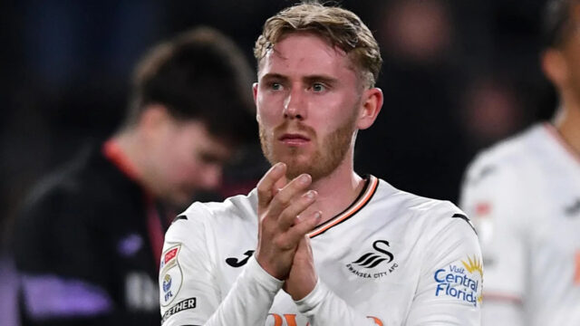 Swansea odvoláva Coopera z pôžičky vo Wigane Swansea odvoláva Coopera z pôžičky vo Wigane
