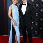 Lachie Neale získal vzácne víťazstvo po tom, čo strávil týždne v centre silných špekulácií o rozpade jeho manželstva s manželkou Jules (na spoločnom obrázku)