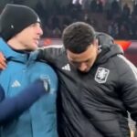 Declan Rice sa rozpráva s Morganom Rogersom