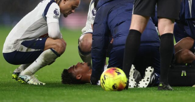 Wilson Odobert receives treatment during a Tottenham Hotspur game