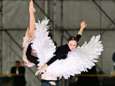 Čo môžete očakávať na otváracom ceremoniáli zimných olympijských hier v roku 2026 – s výkonom Mariah Carey, ktorý má zmiasť milióny fanúšikov Dobrovoľní tanečníci skúšajú počas príprav na otvárací ceremoniál v dočasnej štruktúre vedľa štadióna San Siro