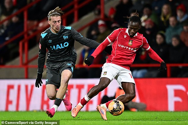 Manažér, ktorý je ŠŤASTNÝ, že bol vyradený, prečo nie je Rozhodnutie Ipswich Town urobiť 10 zmien proti Wrexhamu v FA Cupe zanechalo kyslú chuť