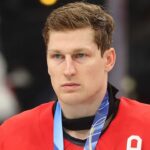 Nathan MacKinnon hovorí, že Kanada bola „lepším tímom“ napriek prehre o zlato s USA v predĺžení