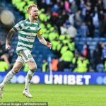 Liam Scales reaguje s radosťou po víťazstve Celticu v penaltovom rozstrele na ihrisku Ibroxu