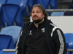 Harrison je „naozaj hrdý“ na posledný zisk titulu Saints Stredopoliar Leo Smith počas prípravného zápasu TNS proti Cardiff City v roku 2021.