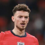 Arsenal a Anglicko brániace Bena Whitea