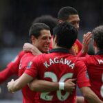 Mexický útočník Manchestru United Javier Hernandez (vľavo) a japonský stredopoliar Manchestru United Shinji Kagawa (C) oslavujú po strelení gólu španielskeho stredopoliara Manchestru United Juana Matu počas futbalového zápasu anglickej Premier League medzi Newcastlom United a Manchestrom United v St James' Park v Newcastle Upon Tyne v severovýchodnom Anglicku 5. apríla 2014-0. Manchester United vyhral. FOTOGRAFIE AFP / IAN MACNICOL OBMEDZENÉ NA REDAKČNÉ POUŽITIE. Nepoužívajte s nepovoleným zvukom, videom, údajmi, súpiskami zápasov, klubovými/ligovými logami alebo živými službami. Online použitie počas zápasu je obmedzené na 45 obrázkov, bez emulácie videa. Nepoužívajte v stávkach, hrách alebo publikáciách pre jednotlivé kluby/ligy/hráčov. (Fotokredit by mal čítať Ian MacNicol/AFP cez Getty Images)