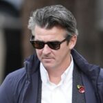 Polícia obvinila Joeyho Bartona z pokusu o útok na golfový klub Huyton