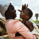 „Bojovala som za Aarona“: Ugandská matka čelí zdravotnému postihnutiu a stigme | Ženy