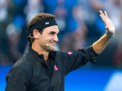 Andy Roddick zdieľa prehliadanú stránku hry Rogera Federera Autor fotografie: Andy Cheung/Getty Images