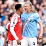 Obranca Arsenalu Gabriel Magalhaes a útočník Manchestru City Erling Haaland