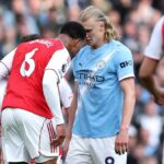 Útočník Manchestru City Erling Haaland a obranca Arsenalu Gabriel sa vyrovnali