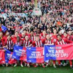 Keith Alexander oslavuje víťazstvo Lincolna v roku 2005