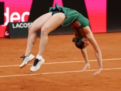 Marta Kostyuk oslavuje najväčší titul kariéry so zadnou pružinou (Getty)