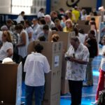 V kľúčových kolumbijských prezidentských voľbách sa otvorili volebné miestnosti | voľby