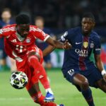 Alphonso Davies z Bayernu Mníchov v akcii s Ousmane Dembele z Paris St Germain 28. apríla 2026. Poďakovanie: REUTERS/Gonzalo Fuentes