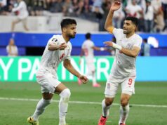 Sľub prezidenta FIFA Gianniho Infantina iránskym hráčom v šatni po otvorení majstrovstiev sveta Sľub prezidenta FIFA Gianniho Infantina iránskym hráčom v šatni po otvorení majstrovstiev sveta