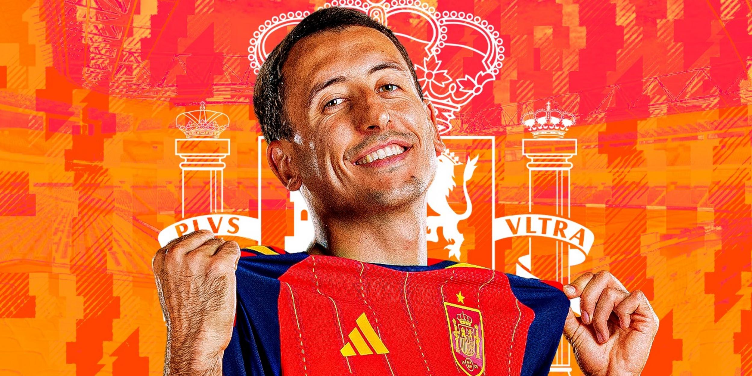 Mikel Oyarzabal sa usmieva v drese španielskeho národného tímu so žiarivým pozadím.